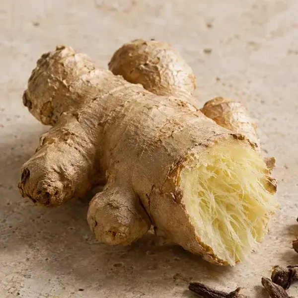 A fresh ginger root, cut open