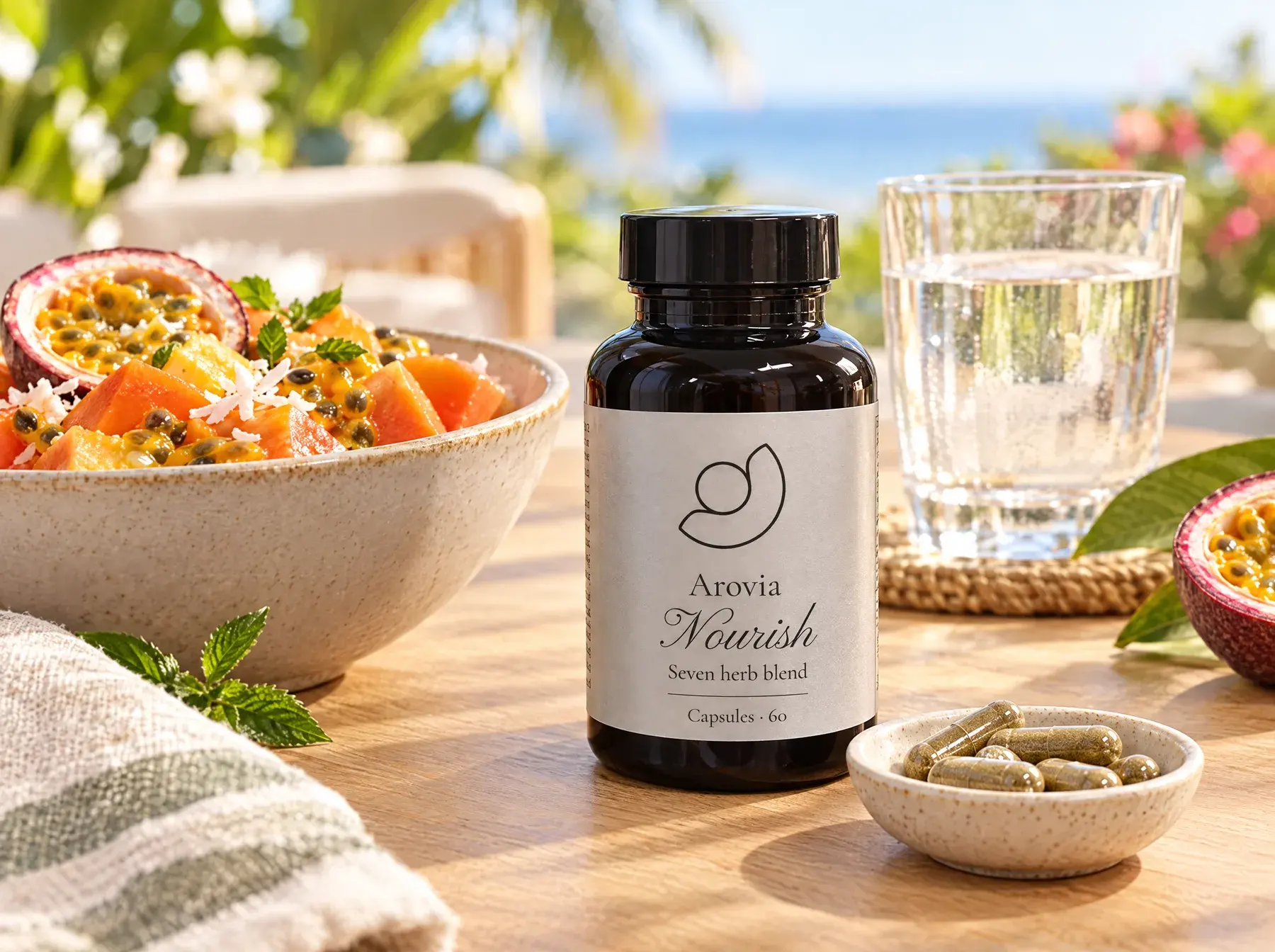 Arovia Nourish bottle on a breakfast table with papaya, passion fruit and a glass of water
