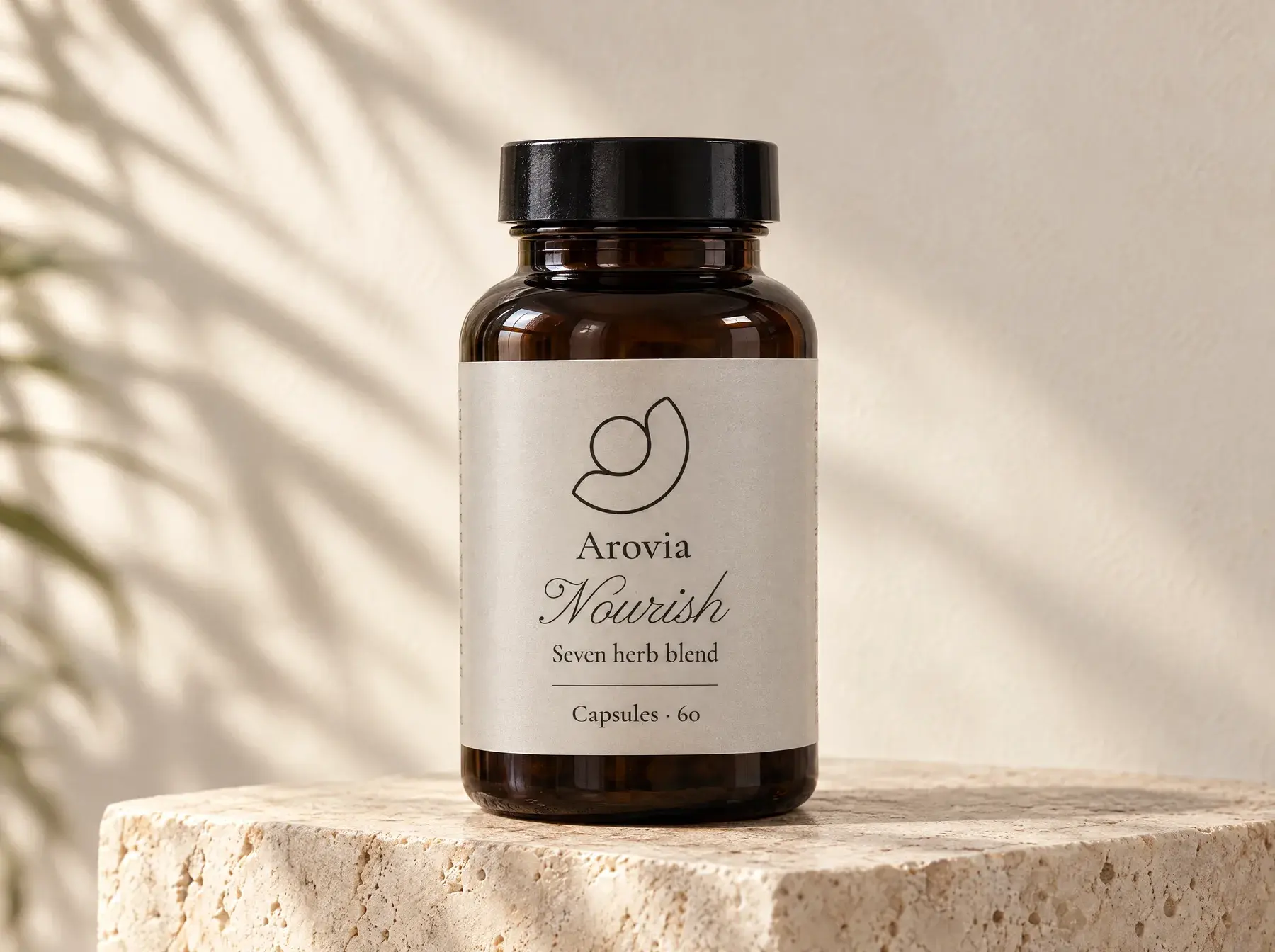 Arovia Nourish capsule bottle on a travertine plinth in soft morning light
