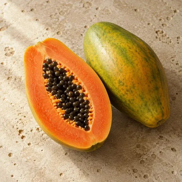 A ripe papaya cut in half
