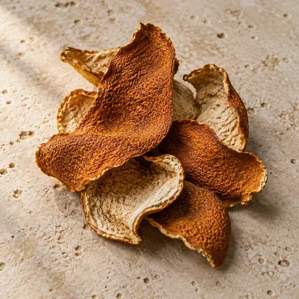 Curled pieces of aged tangerine peel